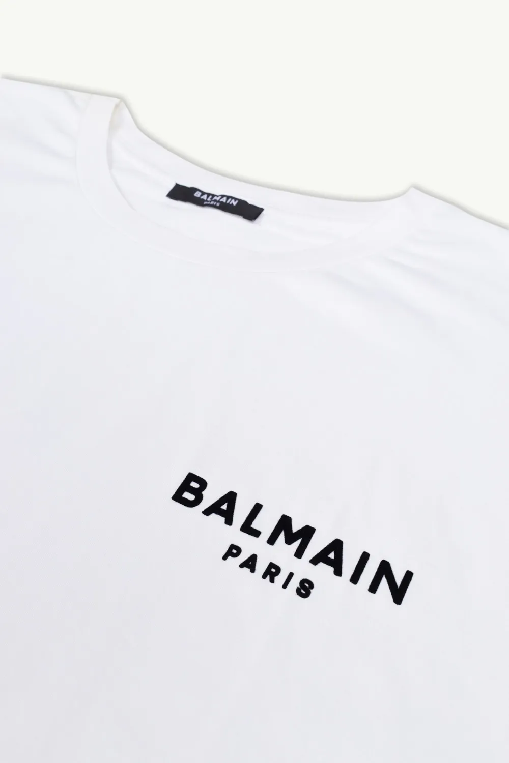 BALMAIN Women Balmain Paris Small Flocked Logo T-Shirt in White/Black 2