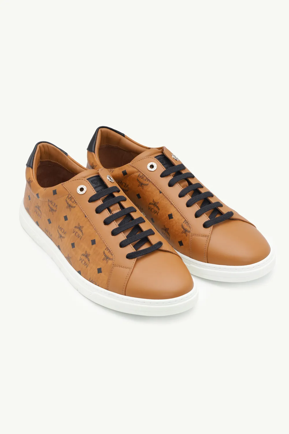 MCM Men Terrain Logo Embossed Low Sneakers in Cognac Visetos 1