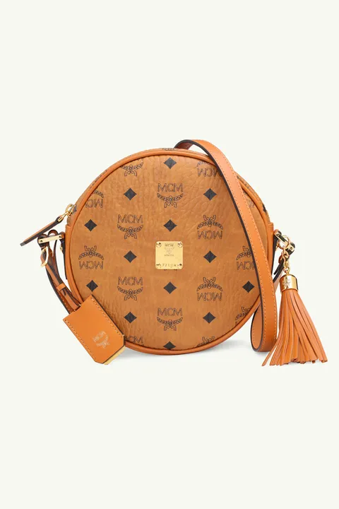 MCM Mini Essential Dome Circle Bag in Cognac